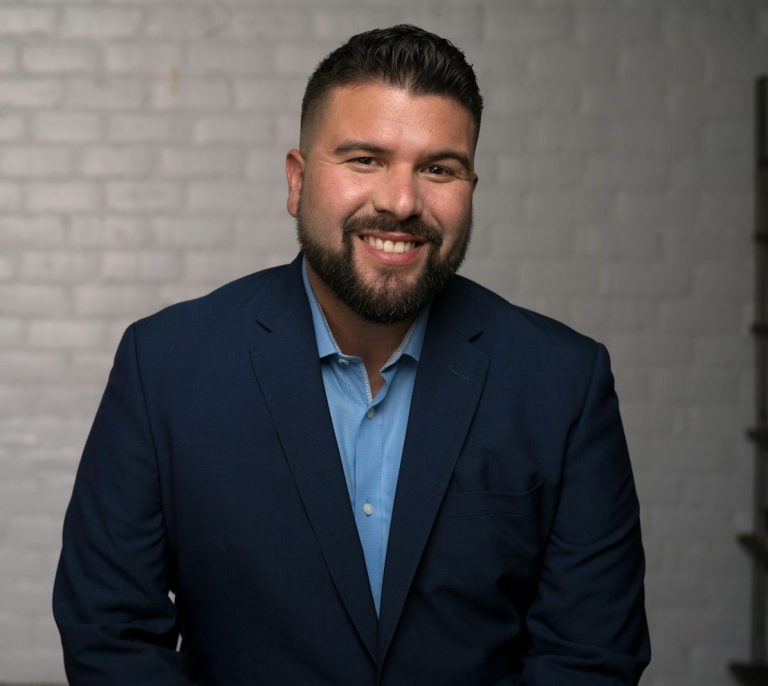 man in blue suit jacket